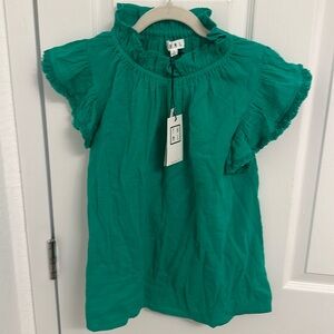 New tank with fringe detail around the neck and sleeves
